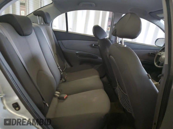 2010 Kia Rio LX with VIN KNADH4A34A6643716, listed as a Copart auction lot 46880375 with 112,265 mi miles and Salvage Title. Bid and sale history available at carsss.com. Image 10.