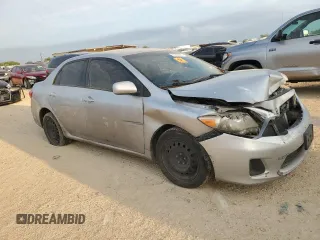 2012 Toyota Corolla L with VIN 5YFBU4EE6CP049772, listed as a Copart auction lot 51233665 with 227,977 mi miles and Clean Title. Bid and sale history available at DreamBid. Image 4.