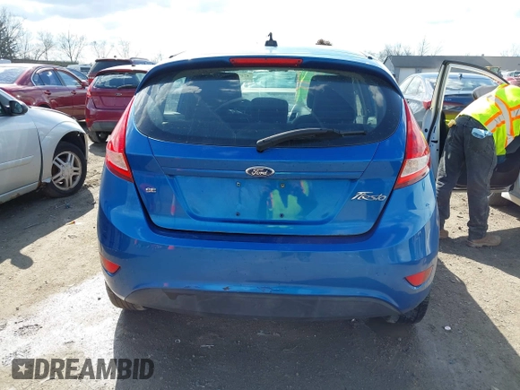 2011 Ford Fiesta SE with VIN 3FADP4EJ0BM173576, listed as a IAAI auction lot 42075691 with 128,835 mi miles. Bid and sale history available at carsss.com. Image 16.