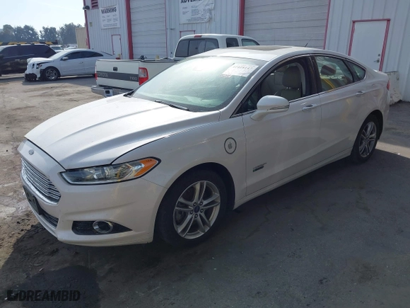 2016 Ford Fusion Energi Titanium with VIN 3FA6P0SU0GR320683, listed as a IAAI auction lot 41428147 with 108,101 mi miles. Bid and sale history available at carsss.com. Image 18.