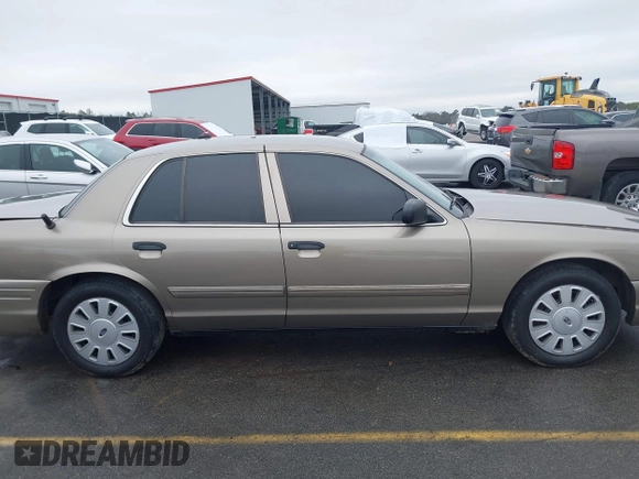 2009 Ford Police Interceptor with VIN 2FAHP71V39X123653, listed as a IAAI auction lot 41538732 with 306,400 mi miles and . Bid and sale history available at DreamBid. Image 13.