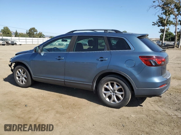 2015 Mazda CX-9 Touring with VIN JM3TB2CV1F0469009, listed as a Copart auction lot 59225785 with 93,330 mi miles and Salvage title. Bid and sale history available at DreamBid. Image 2.