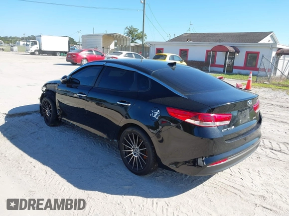 2018 Kia Optima LX with VIN 5XXGT4L3XJG203237, listed as a IAAI auction lot 40631696 with 157,012 mi miles and . Bid and sale history available at DreamBid. Image 3.