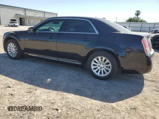 2012 Chrysler 300 with VIN 2C3CCAAG4CH116814, listed as a Copart auction lot 51655975 with 138,371 mi miles and Salvage Title. Bid and sale history available at DreamBid. Image 2.