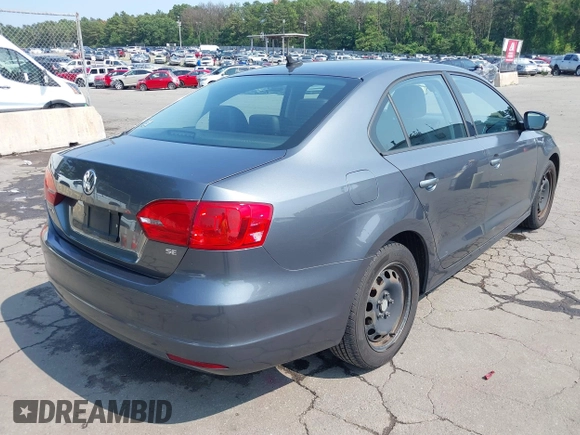 2014 Volkswagen Jetta SE with VIN 3VWD17AJ2EM274963, listed as a IAAI auction lot 42657388 with 138,482 mi miles and . Bid and sale history available at DreamBid. Image 4.