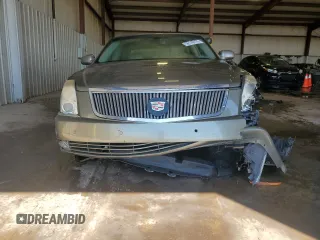 2010 Cadillac DTS 1SC z VIN 1G6KD5EYXAU119017, wystawiony jako Copart lot #56149775 z przebiegiem 113 617 mil mil oraz Szkoda całkowita • Salvage title. Historia ofert i sprzedaży dostępna na DreamBid. Obrazek 5.