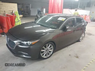 2017 Mazda 3 Touring z VIN JM1BN1V78H1142186, wystawiony jako IAAI lot #42508211 z przebiegiem 109 082 mil mil oraz . Historia ofert i sprzedaży dostępna na DreamBid. Obrazek 17.
