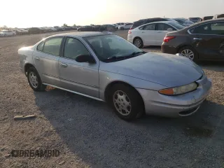 2004 Oldsmobile Alero GX z VIN 1G3NK52F94C146979, wystawiony jako Copart lot #69420344 z przebiegiem 101 408 mil mil oraz Szkody całkowita. Historia ofert i sprzedaży dostępna na DreamBid. Obrazek 4.