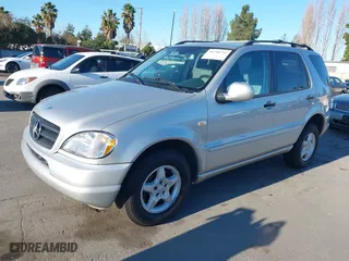 2001 Mercedes-Benz M-Class with VIN 4JGAB54E51A274528, listed as a IAAI auction lot 41290721 with 174,472 mi miles. Bid and sale history available at carsss.com. Image 2.