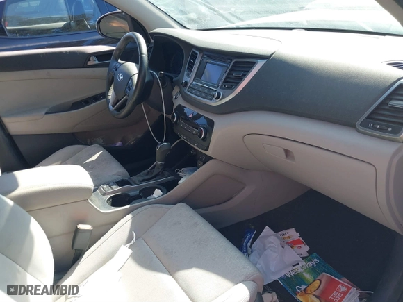 2017 Hyundai Tucson Value with VIN KM8J33A25HU468142, listed as a IAAI auction lot 41382131 with 1 mi miles. Bid and sale history available at carsss.com. Image 5.