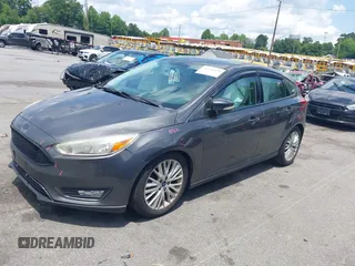 2016 Ford Focus Titanium with VIN 1FADP3N20GL275763, listed as a IAAI auction lot 42511959 with 124,891 mi miles and . Bid and sale history available at DreamBid. Image 2.