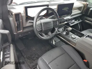 2024 GMC Hummer EV 3X z VIN 1GKB0RDCXRU113305, wystawiony jako Copart lot #52011735 z przebiegiem 5 142 mil mil oraz Szkoda całkowita • Salvage title. Historia ofert i sprzedaży dostępna na DreamBid. Obrazek 8.