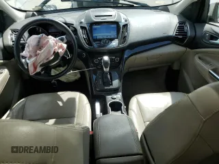 2016 Ford Escape Titanium with VIN 1FMCU9J94GUB31594, listed as a Copart auction lot 51690565 with 119,699 mi miles and Salvage Title. Bid and sale history available at DreamBid. Image 8.