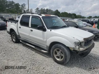 2005 Ford Explorer Sport Trac XLS with VIN 1FMZU67K85UA59170, listed as a Copart auction lot 54472775 with 227,225 mi miles and Salvage title. Bid and sale history available at DreamBid. Image 4.