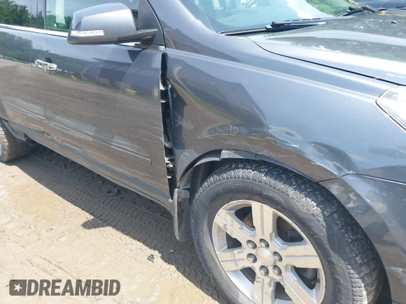 2013 Chevrolet Traverse LT with VIN 1GNKVGKD0DJ120911, listed as a IAAI auction lot 39715616 with 115,367 mi miles and . Bid and sale history available at DreamBid. Image 6.