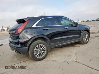 2024 Cadillac XT4 FWD Premium Luxury with VIN 1GYFZCR49RF248341, listed as a Copart auction lot 58586035 with 12,490 mi miles and Salvage title. Bid and sale history available at DreamBid. Image 3.