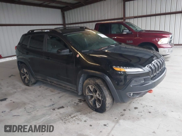 2014 Jeep Cherokee Trailhawk with VIN 1C4PJMBS3EW150366, listed as a IAAI auction lot 41971035 with 90,994 mi miles. Bid and sale history available at carsss.com. Image 12.