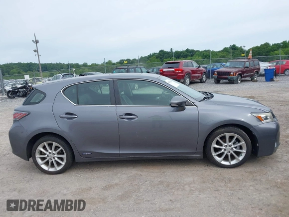 2012 Lexus CT 200h z VIN JTHKD5BH1C2063001, wystawiony jako IAAI lot #42329916 z przebiegiem 123 097 mil mil oraz . Historia ofert i sprzedaży dostępna na DreamBid. Obrazek 13.
