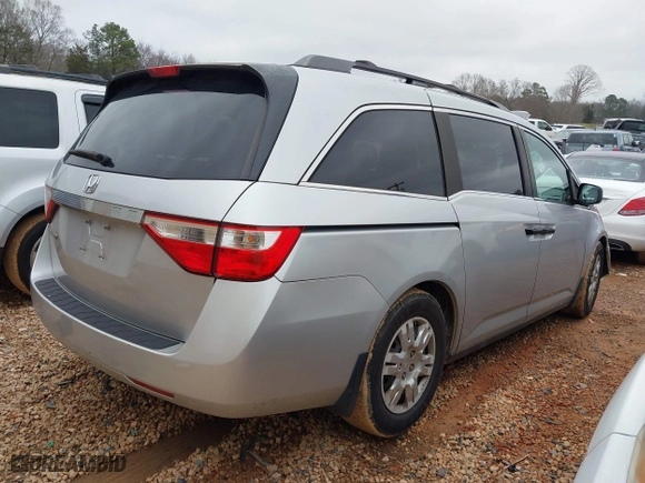2011 Honda Odyssey LX with VIN 5FNRL5H20BB010579, listed as a IAAI auction lot 41217858 with 209,353 mi miles. Bid and sale history available at carsss.com. Image 4.