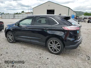 2019 Ford Edge Titanium with VIN 2FMPK4K94KBB35538, listed as a Copart auction lot 57770545 with 85,021 mi miles and Salvage title. Bid and sale history available at DreamBid. Image 2.