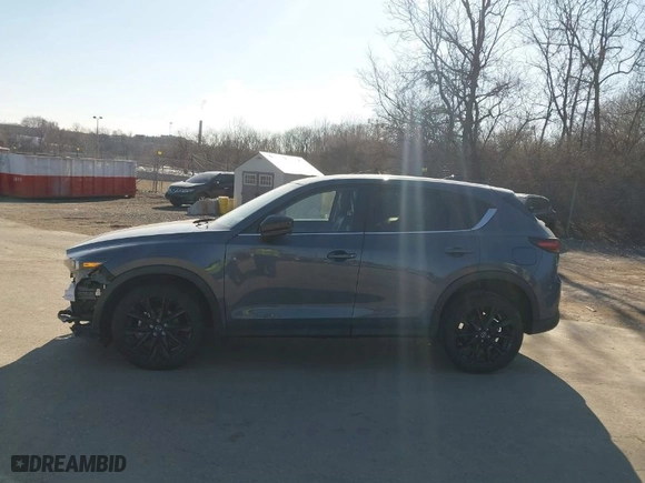 2023 Mazda CX-5 2.5 S Carbon Edition with VIN JM3KFBCMXP0218420, listed as a IAAI auction lot 41701405 with 40,710 mi miles. Bid and sale history available at carsss.com. Image 14.