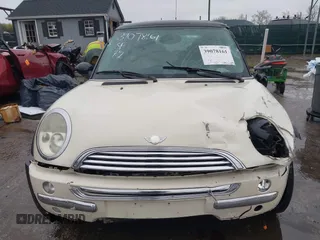 2004 MINI Hardtop with VIN WMWRC33434TJ60941, listed as a IAAI auction lot 39078161 with 143,107 mi miles and . Bid and sale history available at DreamBid. Image 13.
