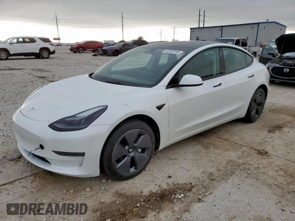 2023 Tesla Model 3 z VIN 5YJ3E1EA3PF488040, wystawiony jako Copart lot #52628165 z przebiegiem 22 326 mil mil oraz Czysty tytuł • Clean title. Historia ofert i sprzedaży dostępna na DreamBid. Obrazek 1.
