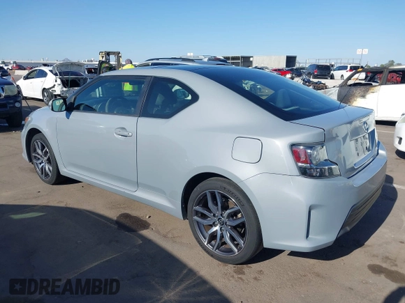 2015 Scion tC with VIN JTKJF5C7XFJ012872, listed as a IAAI auction lot 42128621 with 100,832 mi miles. Bid and sale history available at carsss.com. Image 3.