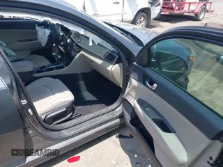 2016 Kia Optima LX with VIN KNAGT4L37G5069524, listed as a IAAI auction lot 42630982 with Not provided miles and . Bid and sale history available at DreamBid. Image 5.