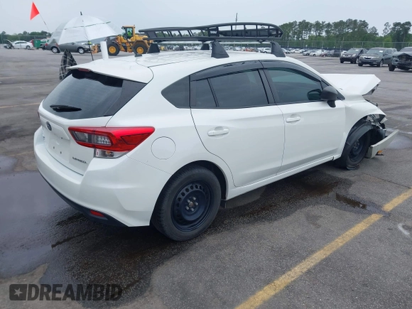2023 Subaru Impreza with VIN 4S3GTAB6XP3706463, listed as a IAAI auction lot 42201164 with 71,572 mi miles and . Bid and sale history available at DreamBid. Image 4.