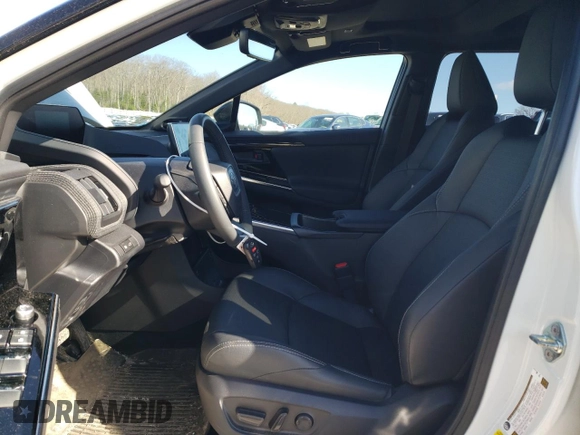 2023 Toyota bZ4X XLE with VIN JTMABACA9PA041997, listed as a Copart auction lot 52922215 with 6,490 mi miles and Salvage Title. Bid and sale history available at DreamBid. Image 7.
