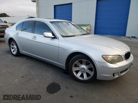 2006 BMW 7 Series 750i with VIN WBAHL83586DT05258, listed as a Copart auction lot 77033744 with 129,376 mi miles and Salvage Title. Bid and sale history available at DreamBid. Image 4.