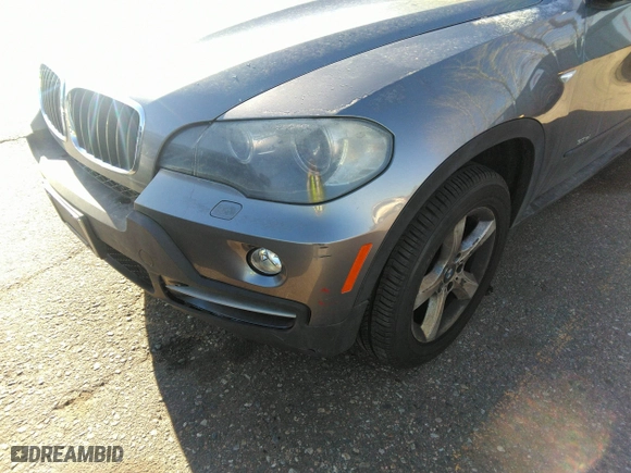 2007 BMW X5 3.0si with VIN 5UXFE43577L010011, listed as a IAAI auction lot 41736230 with 177,768 mi miles. Bid and sale history available at carsss.com. Image 6.