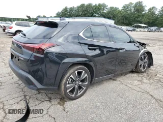 2023 Lexus UX 250h Premium с VIN JTHP6JBH8P2133821, выставлен на аукционе Copart как лот 61007355 с пробегом 32 540 миль миль и Списание • Salvage title. История ставок и продаж доступна на DreamBid. Изображение 3.