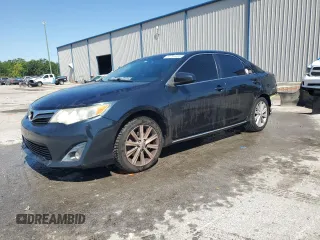 2014 Toyota Camry SE with VIN 4T1BK1FK0EU025526, listed as a Copart auction lot 50795485 with 236,054 mi miles and Salvage Title. Bid and sale history available at carsss.com. Image 1.