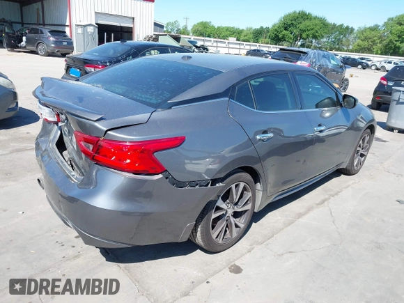 2016 Nissan Maxima SR with VIN 1N4AA6AP9GC414943, listed as a IAAI auction lot 41976295 with 154,738 mi miles and . Bid and sale history available at DreamBid. Image 4.