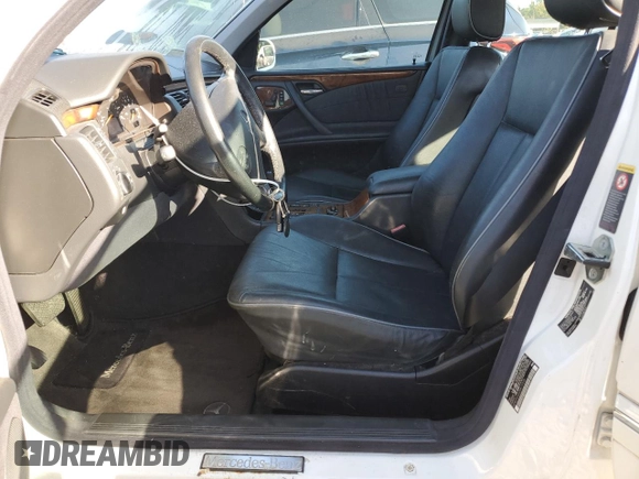 2002 Mercedes-Benz E-Class with VIN WDBJF65J02B473555, listed as a Copart auction lot 75505714 with 0 mi miles and Salvage Title. Bid and sale history available at carsss.com. Image 7.