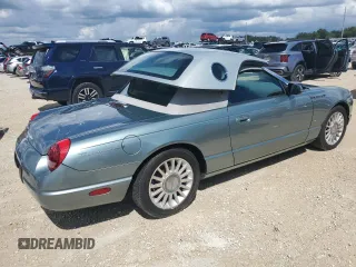 2004 Ford Thunderbird Pacific Coast Roadster with VIN 1FAHP63A04Y108766, listed as a Copart auction lot 74766964 with 30,107 mi miles and Salvage Title. Bid and sale history available at DreamBid. Image 3.