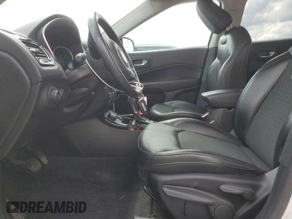 2018 Jeep Compass Altitude with VIN 3C4NJDBB0JT323963, listed as a Copart auction lot 58589415 with 81,036 mi miles and Salvage title. Bid and sale history available at DreamBid. Image 7.
