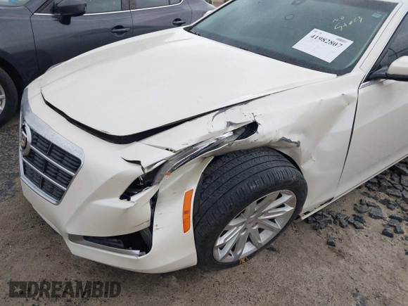 2014 Cadillac CTS Sedan RWD with VIN 1G6AP5SXXE0178113, listed as a IAAI auction lot 41982807 with 111,734 mi miles. Bid and sale history available at carsss.com. Image 6.