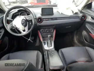 2017 Mazda CX-3 Touring z VIN JM1DKDC71H0172044, wystawiony jako Copart lot #56465125 z przebiegiem 119 374 mil mil oraz Szkoda całkowita • Salvage title. Historia ofert i sprzedaży dostępna na DreamBid. Obrazek 8.