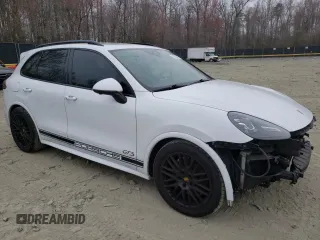 2016 Porsche Cayenne GTS с VIN WP1AD2A26GLA72543, выставлен на аукционе Copart как лот 49081025 с пробегом 160 019 миль миль и Списание • Salvage title. История ставок и продаж доступна на DreamBid. Изображение 4.