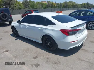 2023 Honda Civic Sport with VIN 2HGFE2F53PH513552, listed as a IAAI auction lot 42595794 with 24,674 mi miles and . Bid and sale history available at DreamBid. Image 3.