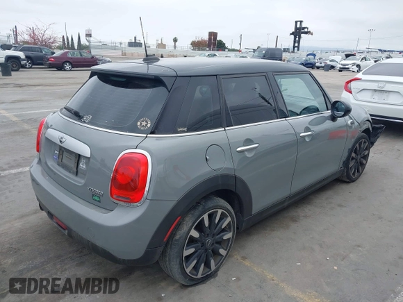 2015 MINI Hardtop 4 Door with VIN WMWXS5C57FT832162, listed as a IAAI auction lot 42159929 with 117,683 mi miles and . Bid and sale history available at DreamBid. Image 4.