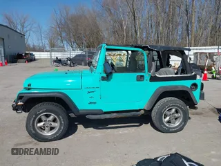 1997 Jeep Wrangler Sport with VIN 1J4FY19S2VP423426, listed as a IAAI auction lot 41734992 with 164,706 mi miles. Bid and sale history available at carsss.com. Image 14.