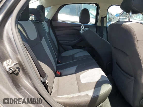 2012 Ford Focus SE z VIN 1FAHP3F23CL328787, wystawiony jako Copart lot #63186125 z przebiegiem 198 629 mil mil oraz Szkoda całkowita • Salvage title. Historia ofert i sprzedaży dostępna na DreamBid. Obrazek 10.