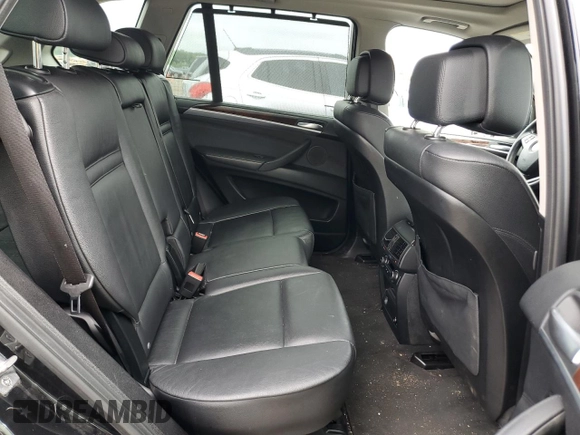 2012 BMW X5 35i with VIN 5UXZV4C50CL989832, listed as a Copart auction lot 62606485 with 157,025 mi miles and Clean title. Bid and sale history available at DreamBid. Image 11.