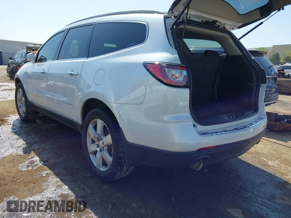 2016 Chevrolet Traverse LTZ z VIN 1GNKRJKDXGJ265413, wystawiony jako IAAI lot #42001292 z przebiegiem 157 129 mil mil oraz . Historia ofert i sprzedaży dostępna na DreamBid. Obrazek 3.