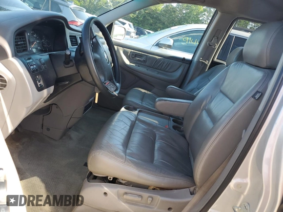 2004 Honda Odyssey EX-L with VIN 5FNRL18044B069774, listed as a Copart auction lot 57096535 with 165,307 mi miles and Salvage title. Bid and sale history available at DreamBid. Image 7.