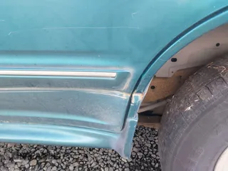 1998 Ford Explorer XL z VIN 1FMZU34E9WZA08004, wystawiony jako IAAI lot #41899669 z przebiegiem 209 832 mil mil oraz . Historia ofert i sprzedaży dostępna na DreamBid. Obrazek 6.